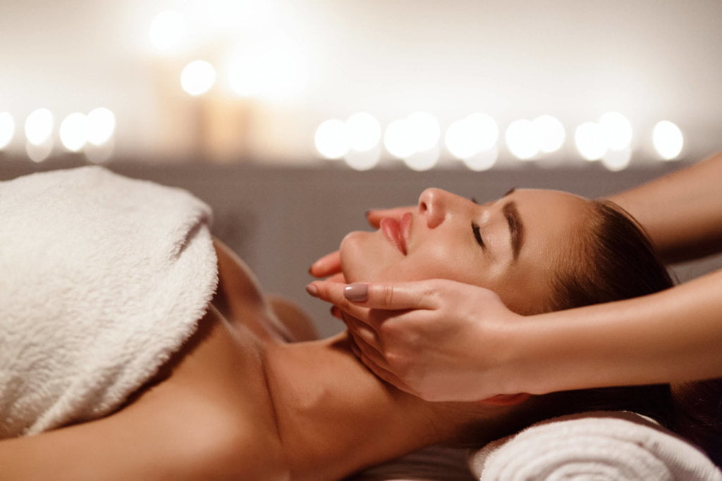 Woman enjoying anti aging facial massage | Skinlogicottawa | Ottawa