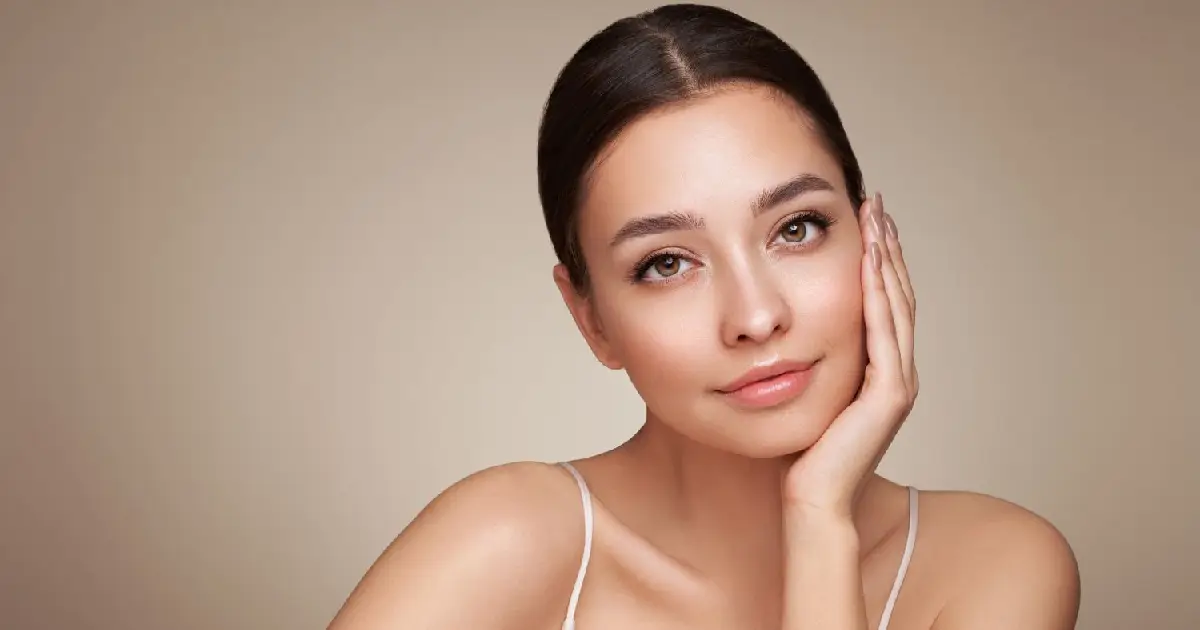 Woman showcasing smooth, glowing skin after ICON MaxG Treatment in Ottawa